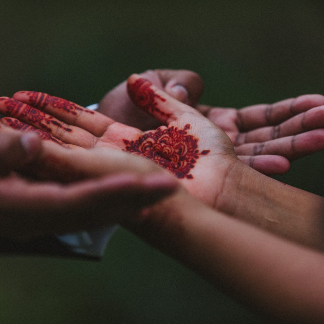 Henna painted hands