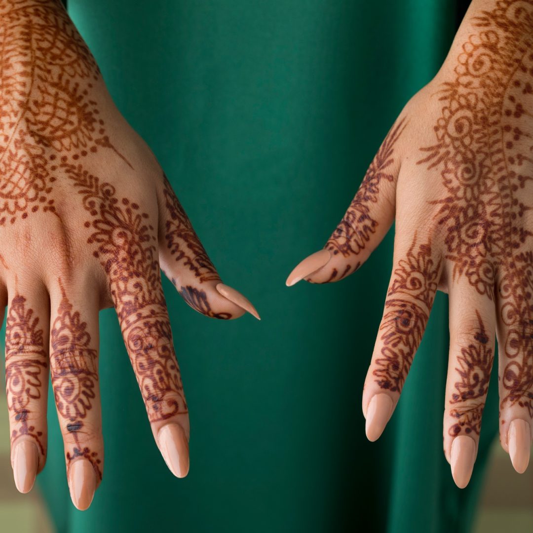 Moroccan woman with henna painted hands